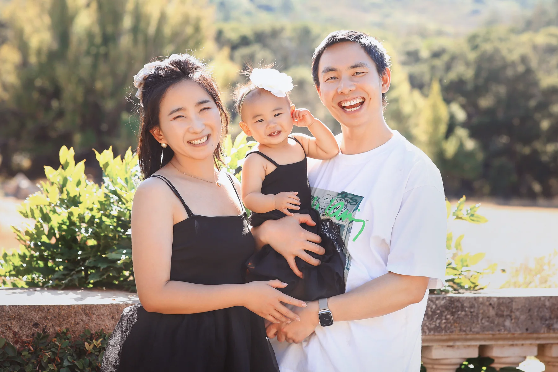 Parents and child enjoying time outdoors together